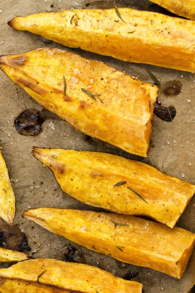 Portion of fresh baked sweet potato wedges — Stock Photo, Image