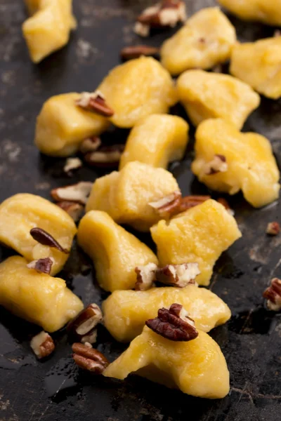 Pumpkin gnocchi with mushroom sauce — Stock Photo, Image