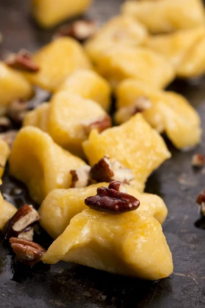 Pumpkin gnocchi with mushroom sauce — Stock Photo, Image