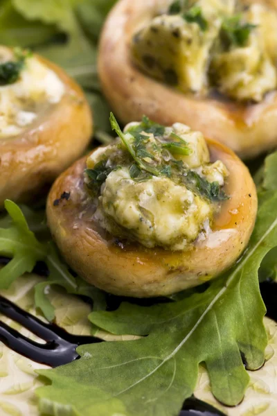 Delicious stuffed mushrooms with cheese and pesto — Stock Photo, Image