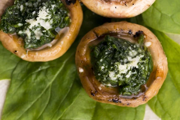 Mushrooms stuffed with spinach — Stock Photo, Image