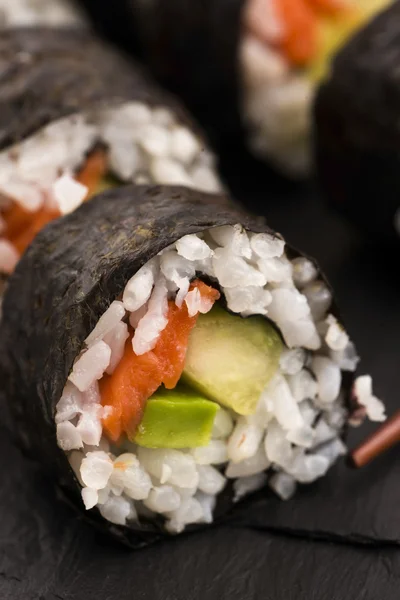 stock image Salmon rolls served on a plate