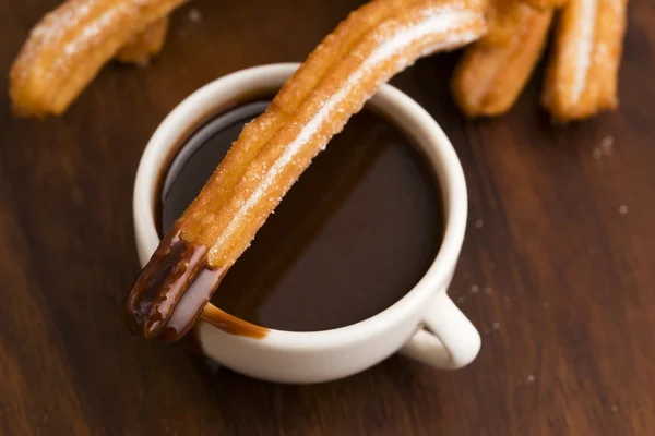 Deliciuos spanish Churros with hot chocolate Royalty Free Stock Photos