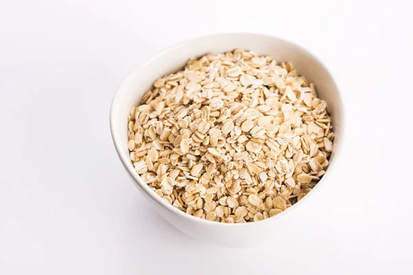 Copos de avena en tazón — Foto de Stock