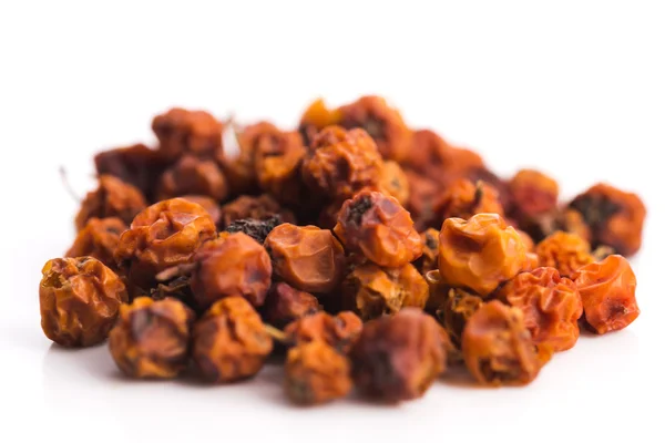 Dried rowan berries on a white background — Stock Photo, Image