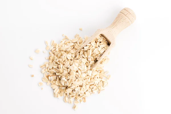 Oat flakes pile on white background — Stock Photo, Image