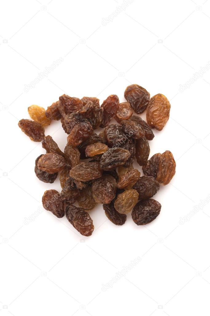 Dried raisins on a white background