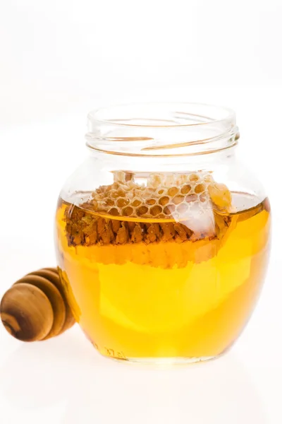 Verse honing met honingraat — Stockfoto