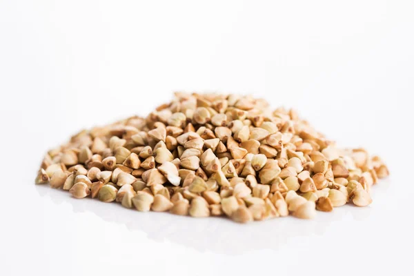 Buckwheat on a white background — Stock Photo, Image