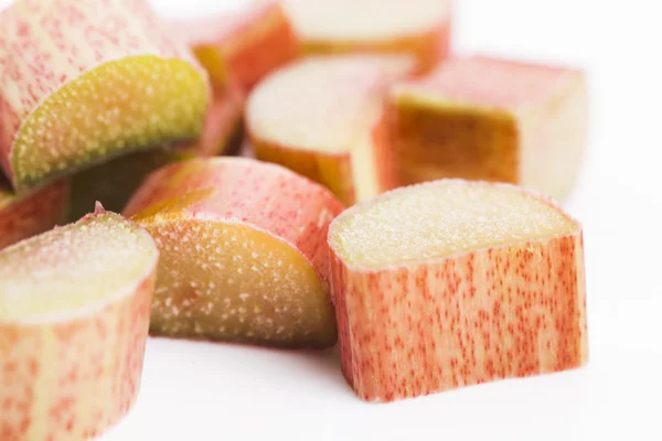 Chopped red rhubarb on white background — Stock Photo, Image