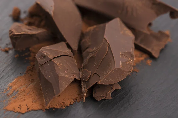 Chopped chocolate with cacao — Stock Photo, Image