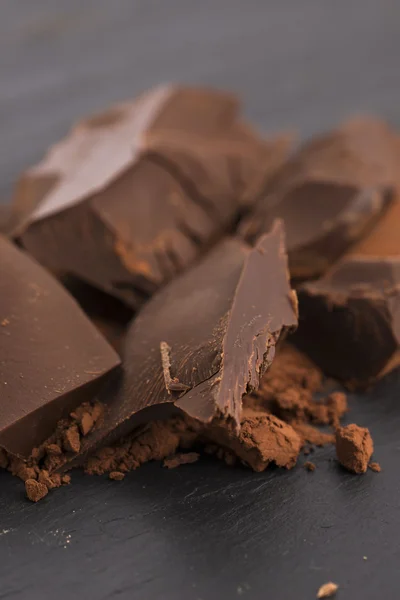 Chopped chocolate with cacao — Stock Photo, Image