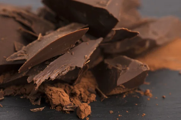 Chopped chocolate with cacao — Stock Photo, Image