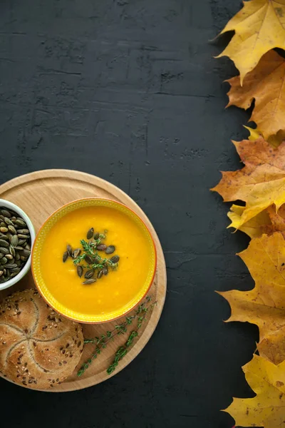 Homemade Pumpkin Cream Soup Seeds Herbs Black Background Top View — Stock Photo, Image