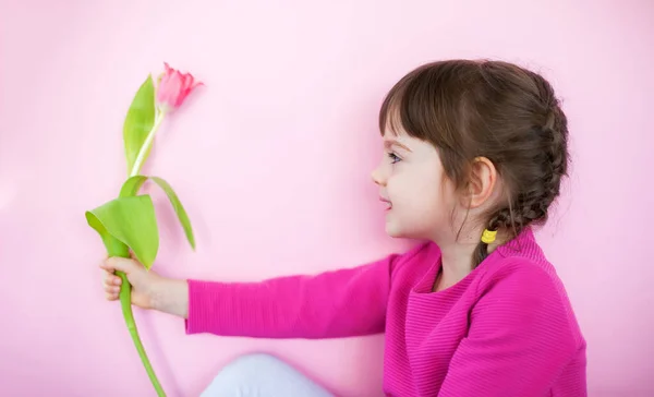 Cute Little Girl Pink Dress Holding Out Pink Tulip Pink — Stock Photo, Image