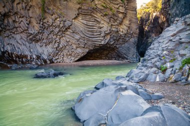 river and rocks at Alcantara Gorge clipart