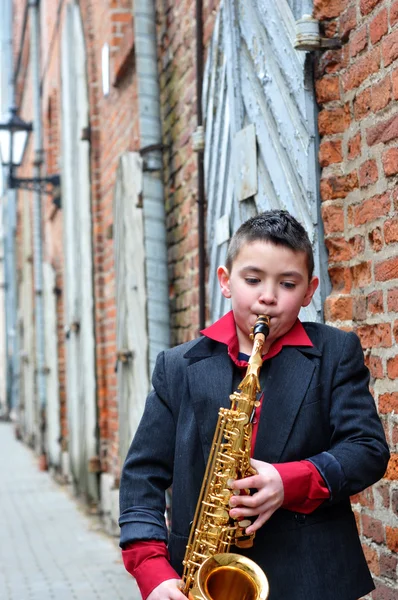 Saxofonista na ulici — Stock fotografie