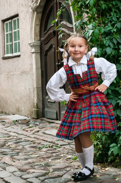 The dancing girl in latvian traditional suit — Stock Photo, Image