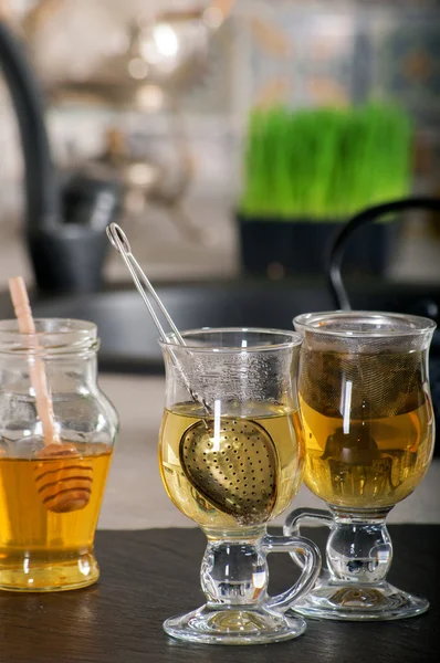 Two cups of tea in the kitchen interior — Stock Photo, Image