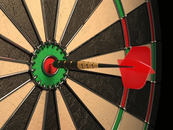 Darts arrow in the target center — Stock Photo, Image