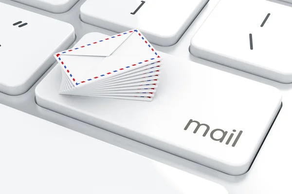 Mail envelopes on the computer keyboard — Stock Photo, Image