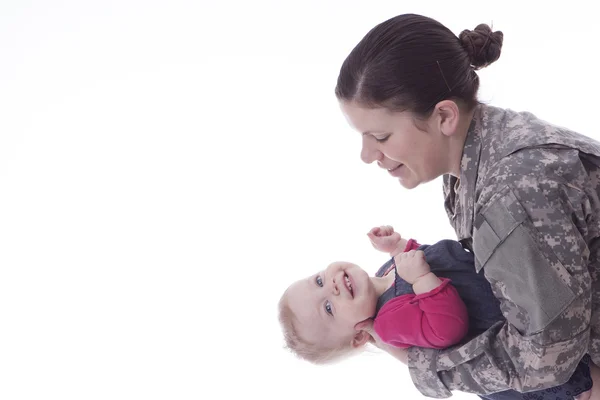 Oss militära mor med sitt barn Stockbild