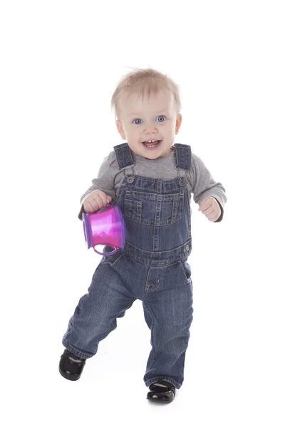 Baby girl in overalls — Stock Photo, Image