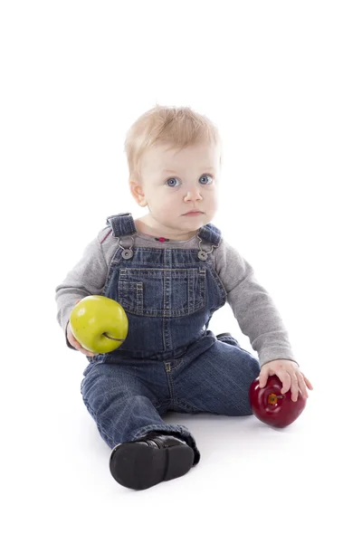 Meisje van de baby in Amerikaanse overalls — Stockfoto