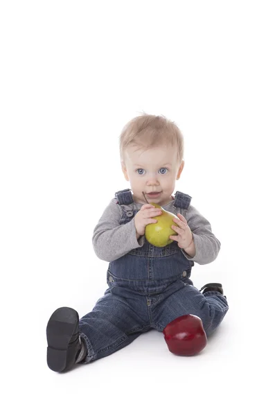 Baby girl in overalls — Stock Photo, Image