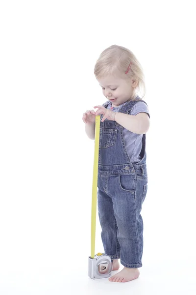 Toddler girl measuring — Stock Photo, Image