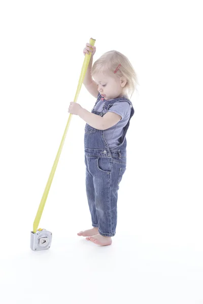 Toddler girl measuring — Stock Photo, Image