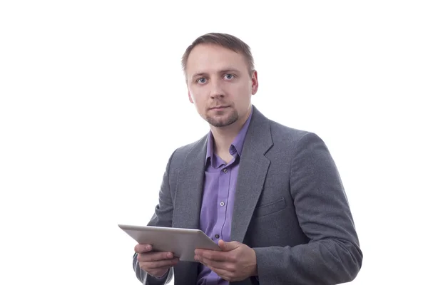 Man in suit holding tablet — Stock Photo, Image