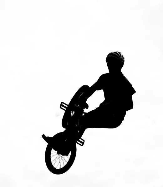 Silhouet van bmx renners in actie — Stockfoto