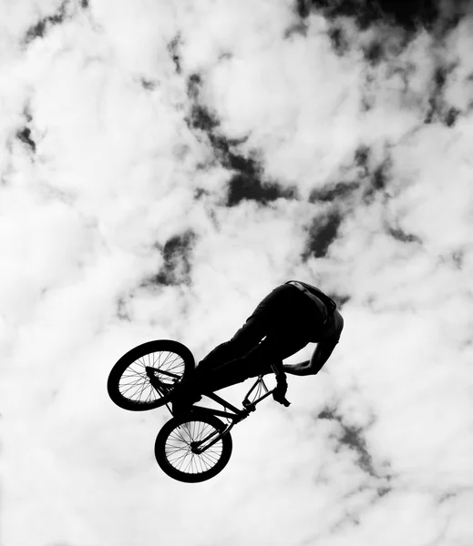 Silhouette of bmx riders in action — Stock Photo, Image