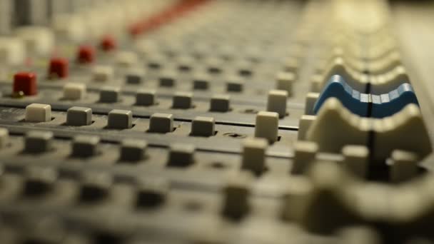 Close up Engineer mixing console recording studio — Stock Video