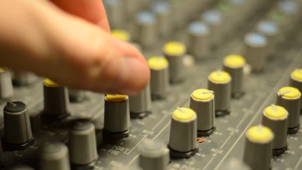 Close up Engineer Mixing Console recording studio — стоковое видео