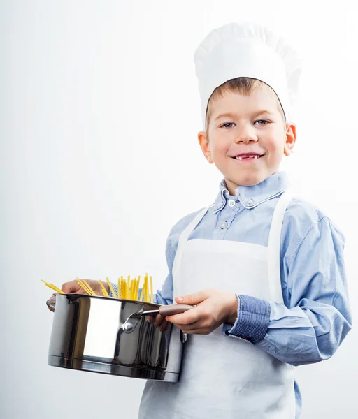 Anak kecil berpakaian seperti koki membuat restoran — Stok Foto