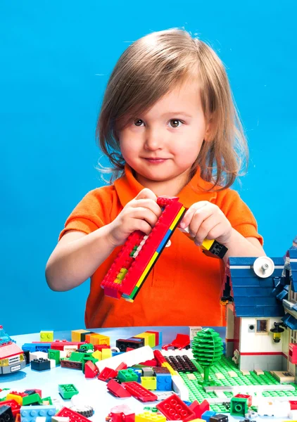 Child playing with construction blocks — Stock Photo, Image