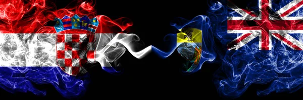 Croatia, Croatian vs British, Britain, Saint Helena smoky mystic flags placed side by side. Thick colored silky abstract smoke flags.