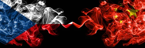 Czech Republic, Czech vs China, Chinese smoky mystic flags placed side by side. Thick colored silky abstract smoke flags.