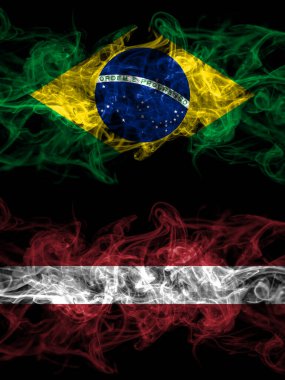 Brezilya, Brezilya Letonya 'ya karşı, Letonya dumanlı mistik bayrakları yan yana yerleştirildi. Kalın renkli ipeksi soyut duman bayrakları.