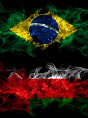 Brazil, Brazilian vs Oman smoky mystic flags placed side by side. Thick colored silky abstract smoke flags.