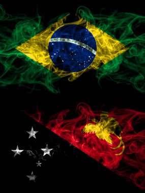 Brazil, Brazilian vs Papua New Guinea smoky mystic flags placed side by side. Thick colored silky abstract smoke flags.