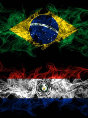 Brazil, Brazilian vs Paraguay, Paraguayan smoky mystic flags placed side by side. Thick colored silky abstract smoke flags.