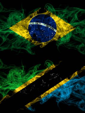 Brezilya, Brezilya, Tanzanya 'ya karşı yan yana yerleştirilmiş dumanlı mistik bayraklar. Kalın renkli ipeksi soyut duman bayrakları.