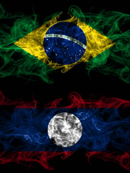 ブラジル ブラジル対ラオス煙霧の神秘的なフラグを並んで配置します 濃い色の絹のような抽象的な煙のフラグ — ストック写真