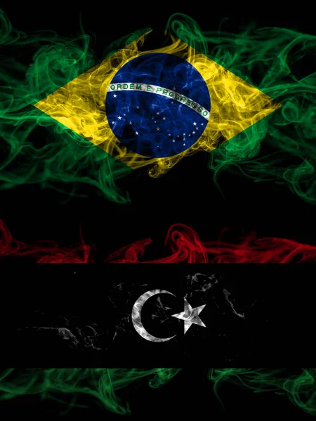 ブラジル ブラジル対リビア リビアの煙霧の旗が並んで配置されます 濃い色の絹のような抽象的な煙のフラグ — ストック写真