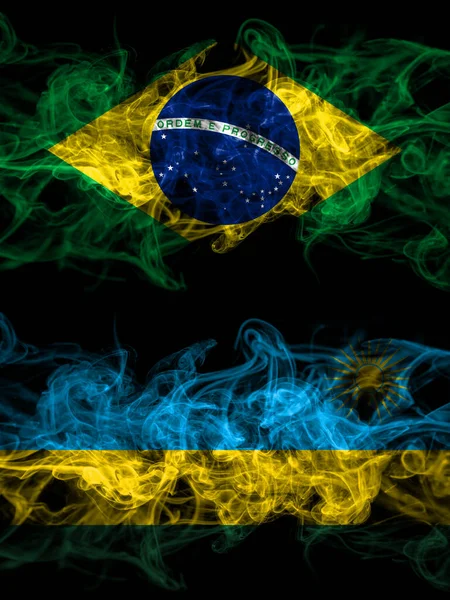 Brazil, Brazilian vs Rwanda smoky mystic flags placed side by side. Thick colored silky abstract smoke flags.