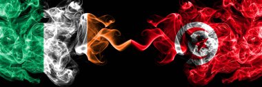 Republic of Ireland, Irish vs Tunisia smoky mystic flags placed side by side. Thick colored silky abstract smoke flags.