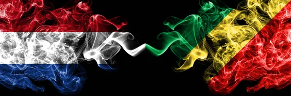 Ολλανδία Εναντίον Κονγκό Κονγκό Καπνιστή Μυστικιστική Σημαίες Τοποθετούνται Δίπλα Δίπλα — Φωτογραφία Αρχείου